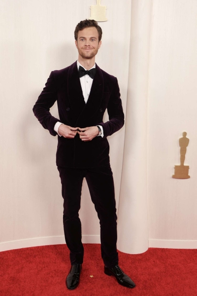 Actors at the 96th Academy awards broke the style rules of yesteryear on the red carpet in bold colors, suave tuxedos, and other dashing designs. See ahead for our picks of the best dressed men at the 2024 Oscars.