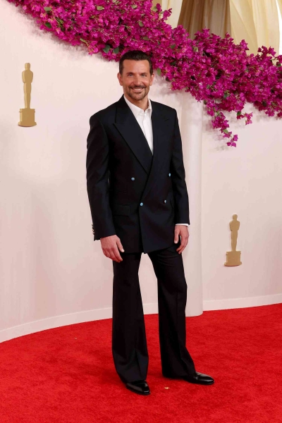 Actors at the 96th Academy awards broke the style rules of yesteryear on the red carpet in bold colors, suave tuxedos, and other dashing designs. See ahead for our picks of the best dressed men at the 2024 Oscars.
