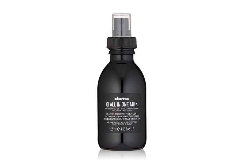 An editor with dry, frizzy hair reviews Davines’ Oi All in One Milk leave-in conditioner, which is available at Amazon for $40.