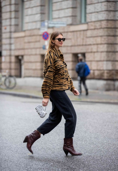 Cowboy boots are back on the scene and now's the time to reinvest in the classic style. Here are 9 chic and cool ways to wear them with your favorite pair of jeans.