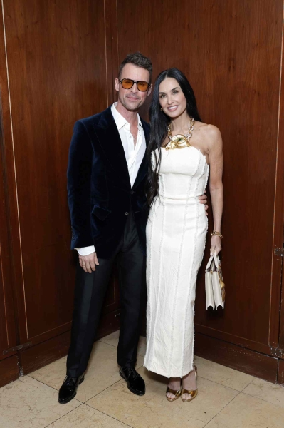 Demi Moore attended The Hollywood Reporter's Power Stylists event at the Sunset Tower Hotel in Los Angeles on Wednesday while wearing a white Schiaparelli dress with the coolest neckline.