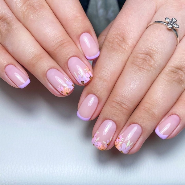 French nails are equally classic and versatile, which makes them the perfect anchor for a refreshing spring manicure.