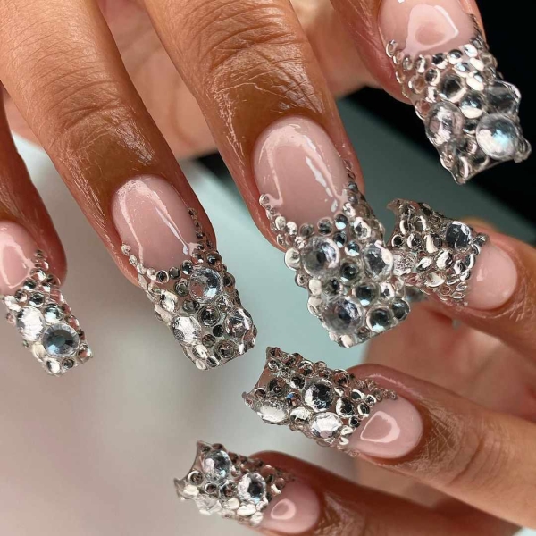 Gem nail designs can range from subtle and demure to bold and chunky. Here are 30 blinged-out options to consider for your next manicure.