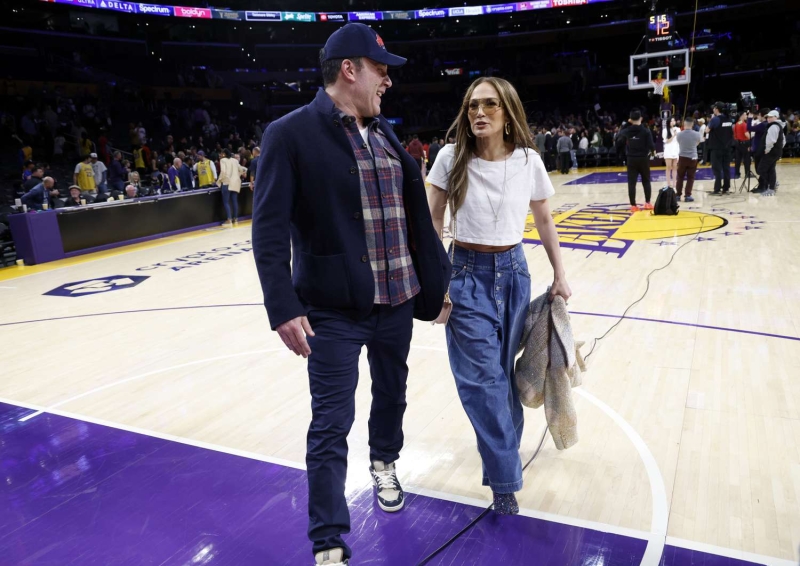 Jennifer Lopez sat courstside at a Los Angeles Lakers game in a pair of distracting rhinestone-studded boots.