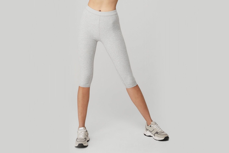 Kendall Jenner recently wore Alo Yoga capri leggings, the controversial pants trend that will be everywhere this spring. Shop similar comfy, calf-bearing pants from Tory Burch, Vince, and more.