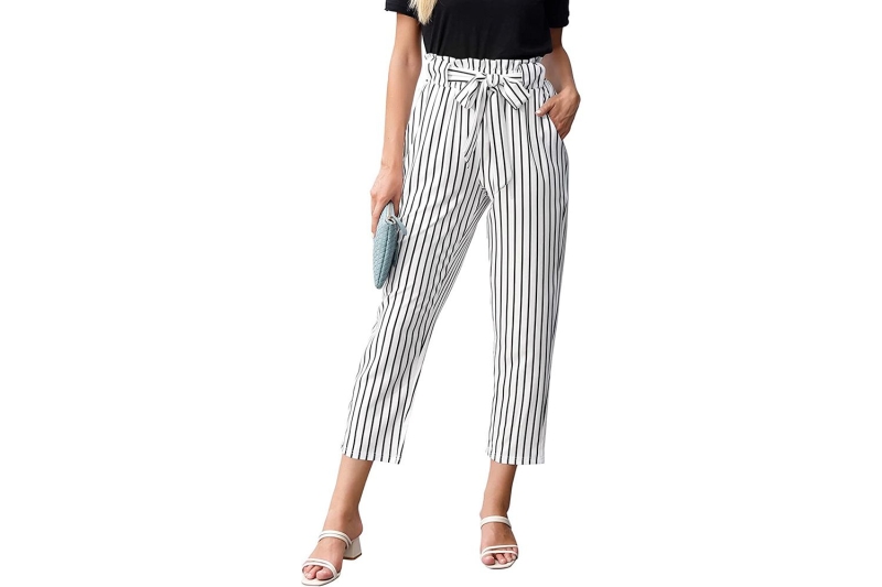 Look of the Day for March 6, 2024 features Sophie Turner wearing striped high-waisted trousers. Shop similar patterned pants at Amazon, J.Crew, and Bloomingdales.