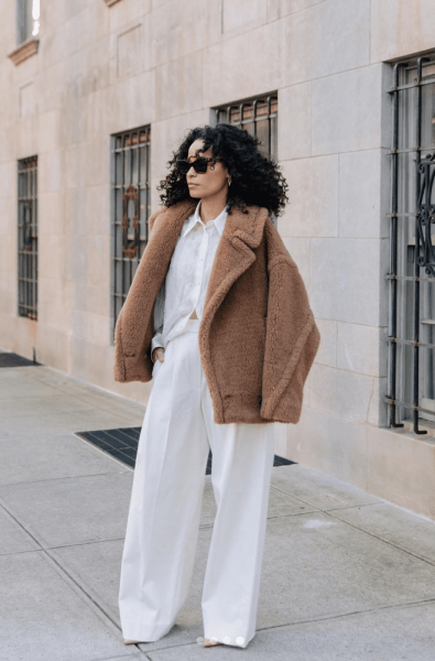 Max Mara's teddy coat turned 10-years-old so why not discover all the different ways you can style this iconic piece with any outfit.
