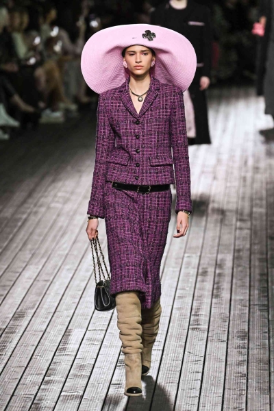 See the best looks from Paris Fashion Week's FW24 Ready-to-Wear collections from brands like Chanel, Louis Vuitton, Schiaparelli, and more.