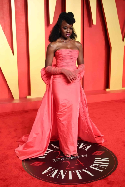 The glamour of the 2024 Oscars continued at the 'Vanity Fair' Oscar party on Sunday, March 10, when stars arrived to serve up outfit changes and even more red carpet-worthy fashion. See the best looks from Jennifer Coolidge, Kerry Washington, Kim Kardashian, Emily Ratajkowski, and more.