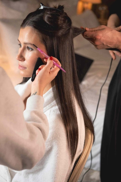 TikTok's Delaney Rowe takes us through her makeup, hair, and outfit for Loewe's FW24 show during Paris Fashion Week. See her full look and get the exclusive details here.