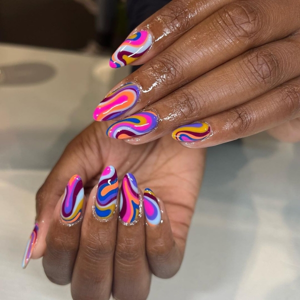 Aries is a fire sign that's known for its fearless yet playful nature. So you'll want bold and firey elements in an Aries nail look. Here are 20 options to inspire you.