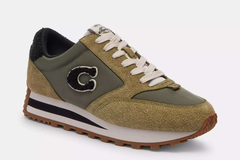 Coach’s Runner Sneakers are one shopping writer’s new go-to footwear option for elevated outfits. The sleek and comfortable shoes are currently 30 percent off in green.