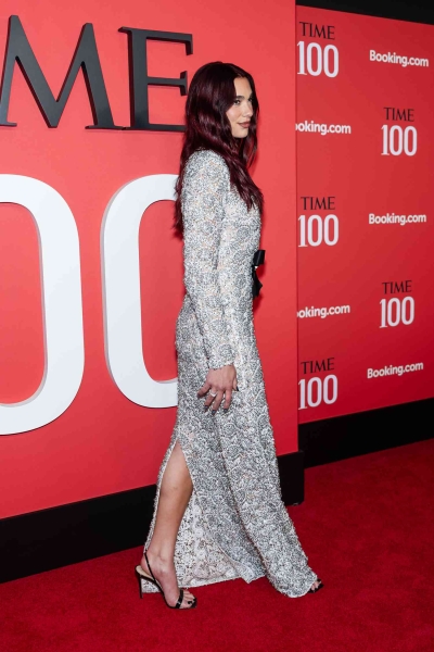 Dua Lipa arrived at the 2024 Time100 Gala in a custom Chanel gown that featured a polarizing belly button cutout.