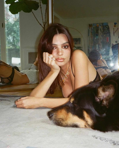 Emily Ratajkowski shared photos of her lounging around the house in a bra and gray sweatpants on Instagram.