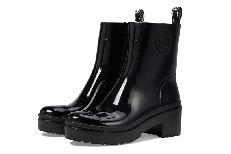 Irina Shayk wore knee-high black rain boots. I found seven similar styles from brands including Hunter, Merry People, and Melissa, with prices starting at $31.