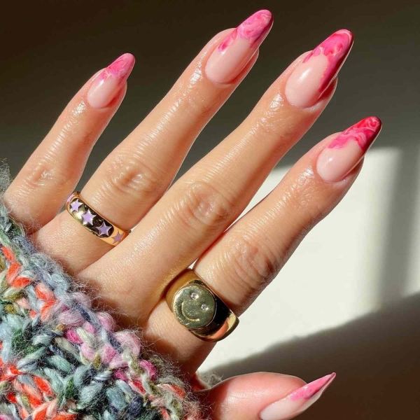 Marble nail art was popular in the early 2010s and is proving to be enduring. To show you, we rounded up over a dozen ethereal marble nail designs to dress up your mani in the months to come.