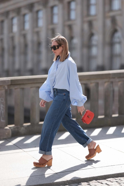 These clog outfit ideas prove there's no wrong way to wear clogs. These sturdy shoes go with everything from shorts to skirts and dresses.