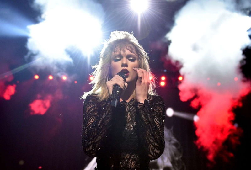 Throughout Taylor Swift's nearly 20-year career, she's leaned on red lipstick as her staple beauty look. Here's how it started, the meaning behind her power color, and the lip products she uses most.