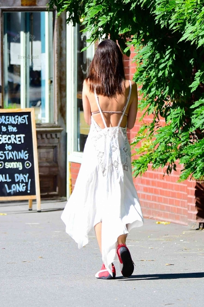 Emily Ratajkowski wore a see-through white sundress with red sneakers in New York City on May 29. Her sheer outfit comes shortly after her trip to Monaco for the Formula 1 Grand Prix.