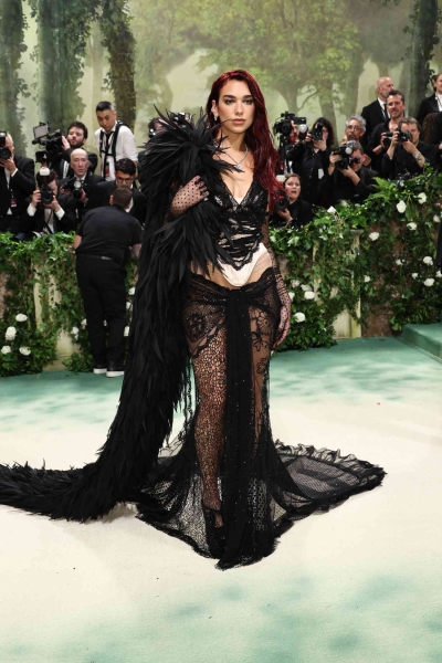 From barely-there sheers to floral fantasies, these are the sexiest looks spotted on the 2024 Met Gala red carpet worn by Emily Ratajkowski, Emma Chamberlin, Jennifer Lopez, and more.