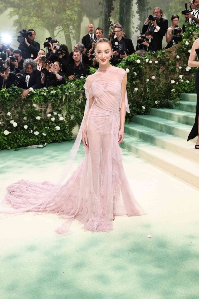 From barely-there sheers to floral fantasies, these are the sexiest looks spotted on the 2024 Met Gala red carpet worn by Emily Ratajkowski, Emma Chamberlin, Jennifer Lopez, and more.