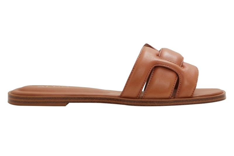 I rounded up eight comfy slip-on sandals for summer from Birkenstock, Crocs, Aldo, Tory Burch, and more. They all have plush insoles and comfortable straps, and prices start at $25.