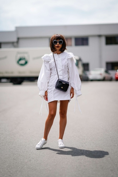 It’s time to polish up your white sneakers. From warm weather dresses to stylish separates, all the white sneaker outfit inspiration you need is right here.