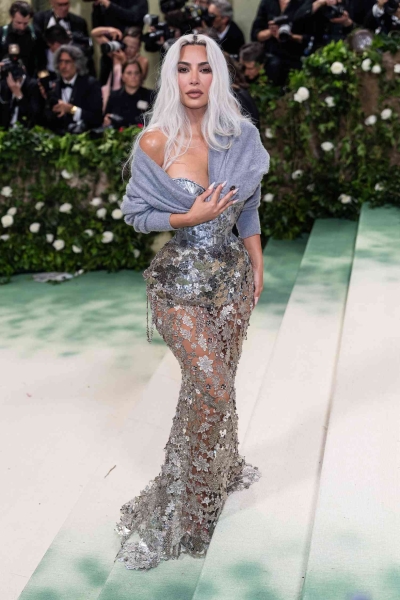Kim Kardashian sparked controversy once again with a second corset following the 2024 Met Gala. See her look here.