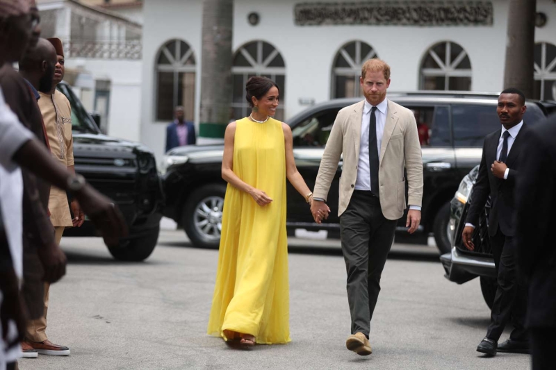 Meghan Markle wore a bright red midi dress from Orire to co-host the Women in Leadership Panel in Nigeria on May 11.