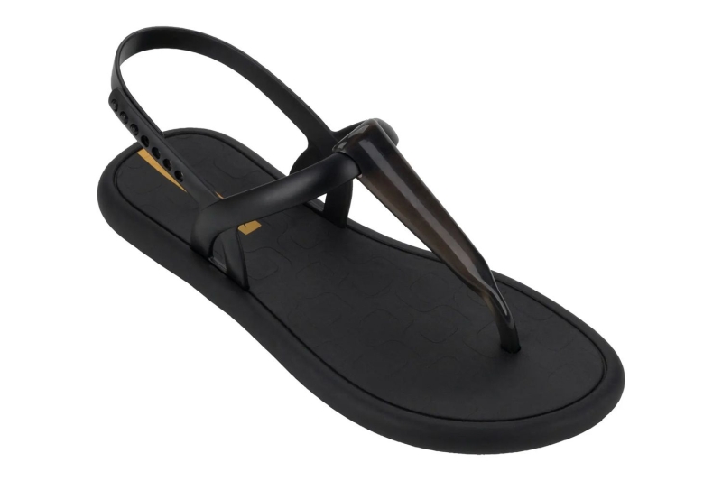 Meghan Markle wore a pair of thong sandals on her trip to Abuja, Nigeria to promote the Invictus Games. Shop similar summer footwear at Amazon, Nordstrom, and DSW, starting at $22.