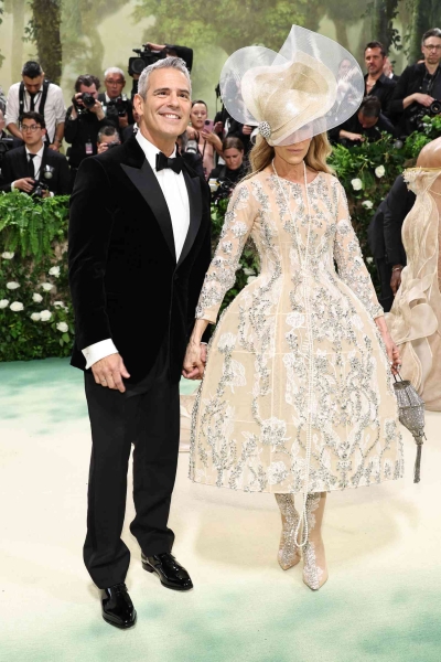 Sarah Jessica Parker wore a Richard Quinn dress covered in flower embellishment to the 2024 Met Gala. See the look, here.