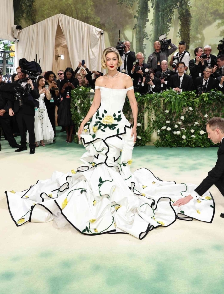 The 2024 Met Gala is a star-studded occasion like no other, and we've got the red carpet photos to prove it. See all the celeb arrivals, including Emma Chamberlain, Jennifer Lopez, and more at this year's Met Gala right here.