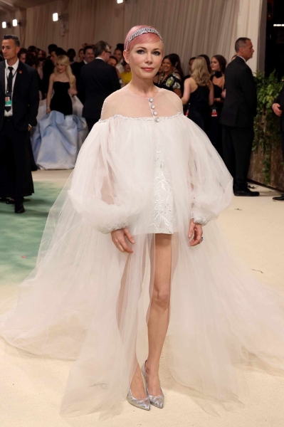 The 2024 Met Gala is a star-studded occasion like no other, and we've got the red carpet photos to prove it. See all the celeb arrivals, including Emma Chamberlain, Jennifer Lopez, and more at this year's Met Gala right here.