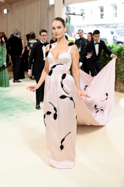 The 2024 Met Gala is a star-studded occasion like no other, and we've got the red carpet photos to prove it. See all the celeb arrivals, including Emma Chamberlain, Jennifer Lopez, and more at this year's Met Gala right here.