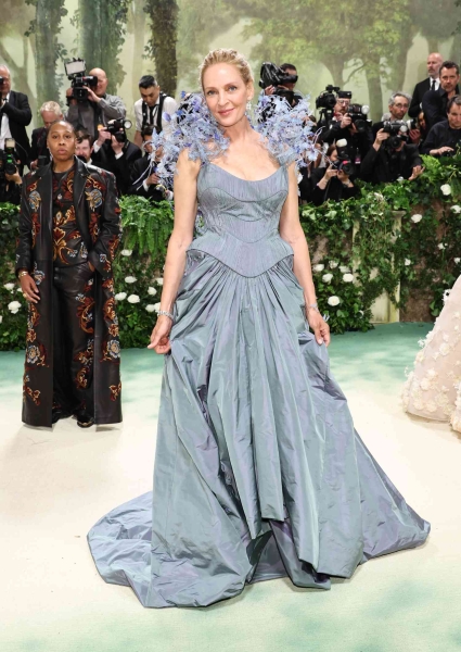 The 2024 Met Gala is a star-studded occasion like no other, and we've got the red carpet photos to prove it. See all the celeb arrivals, including Emma Chamberlain, Jennifer Lopez, and more at this year's Met Gala right here.