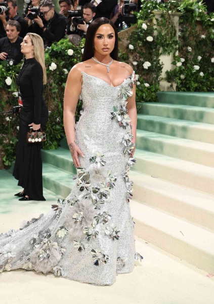 The 2024 Met Gala is a star-studded occasion like no other, and we've got the red carpet photos to prove it. See all the celeb arrivals, including Emma Chamberlain, Jennifer Lopez, and more at this year's Met Gala right here.