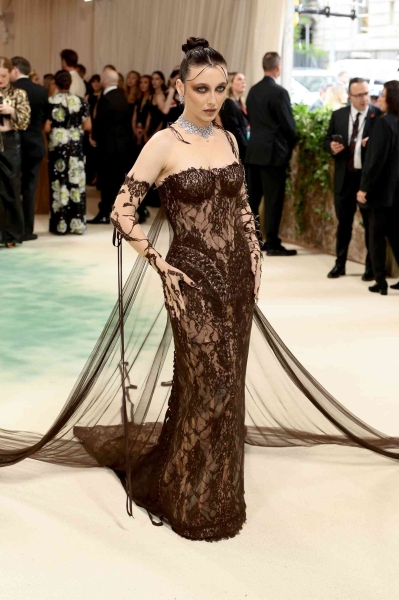 The 2024 Met Gala is a star-studded occasion like no other, and we've got the red carpet photos to prove it. See all the celeb arrivals, including Emma Chamberlain, Jennifer Lopez, and more at this year's Met Gala right here.