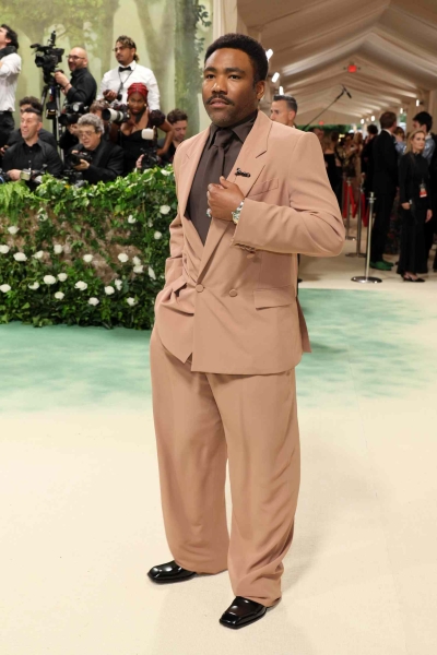 The 2024 Met Gala is a star-studded occasion like no other, and we've got the red carpet photos to prove it. See all the celeb arrivals, including Emma Chamberlain, Jennifer Lopez, and more at this year's Met Gala right here.